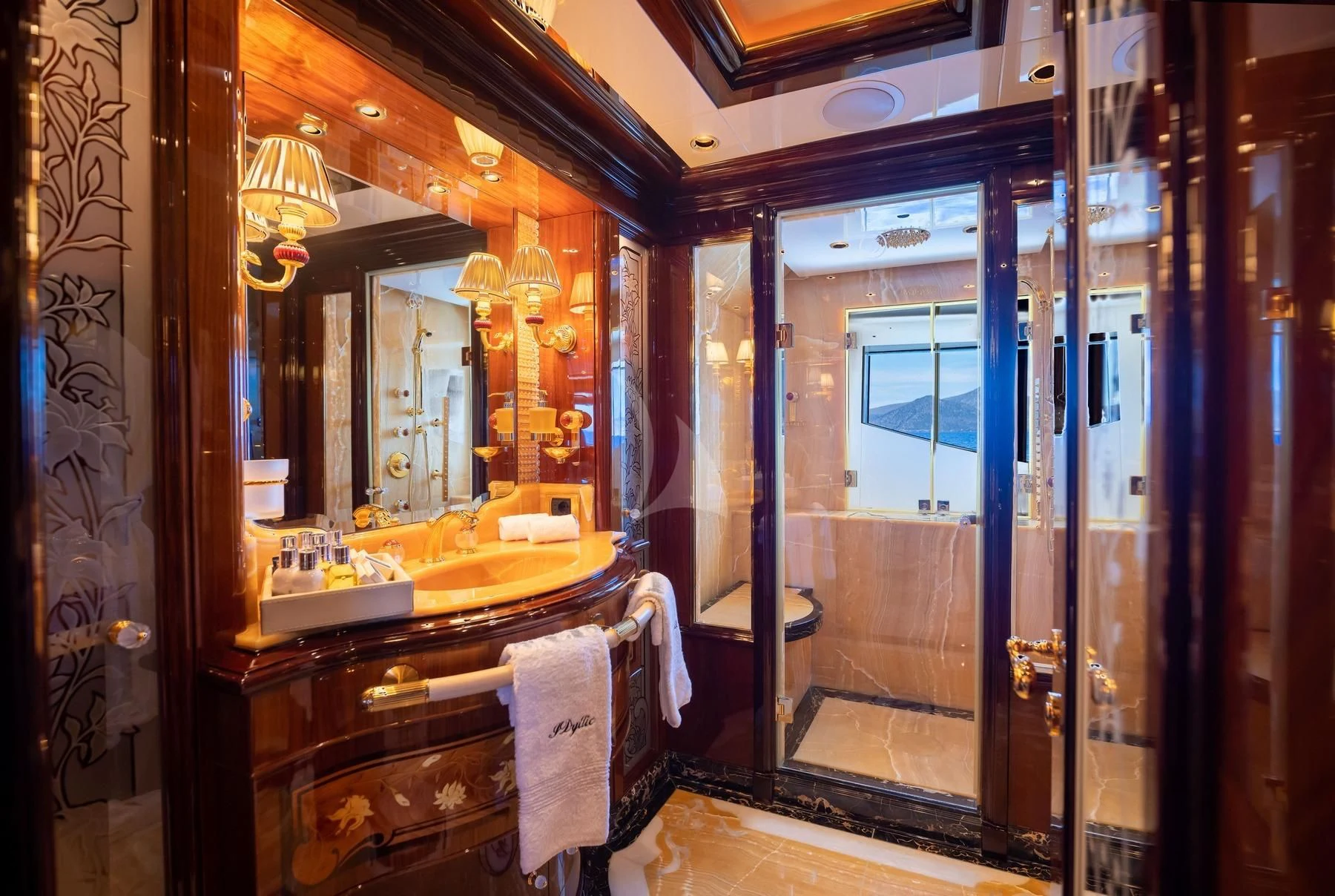 a bathroom with a large mirror aboard DILARA Yacht for Sale