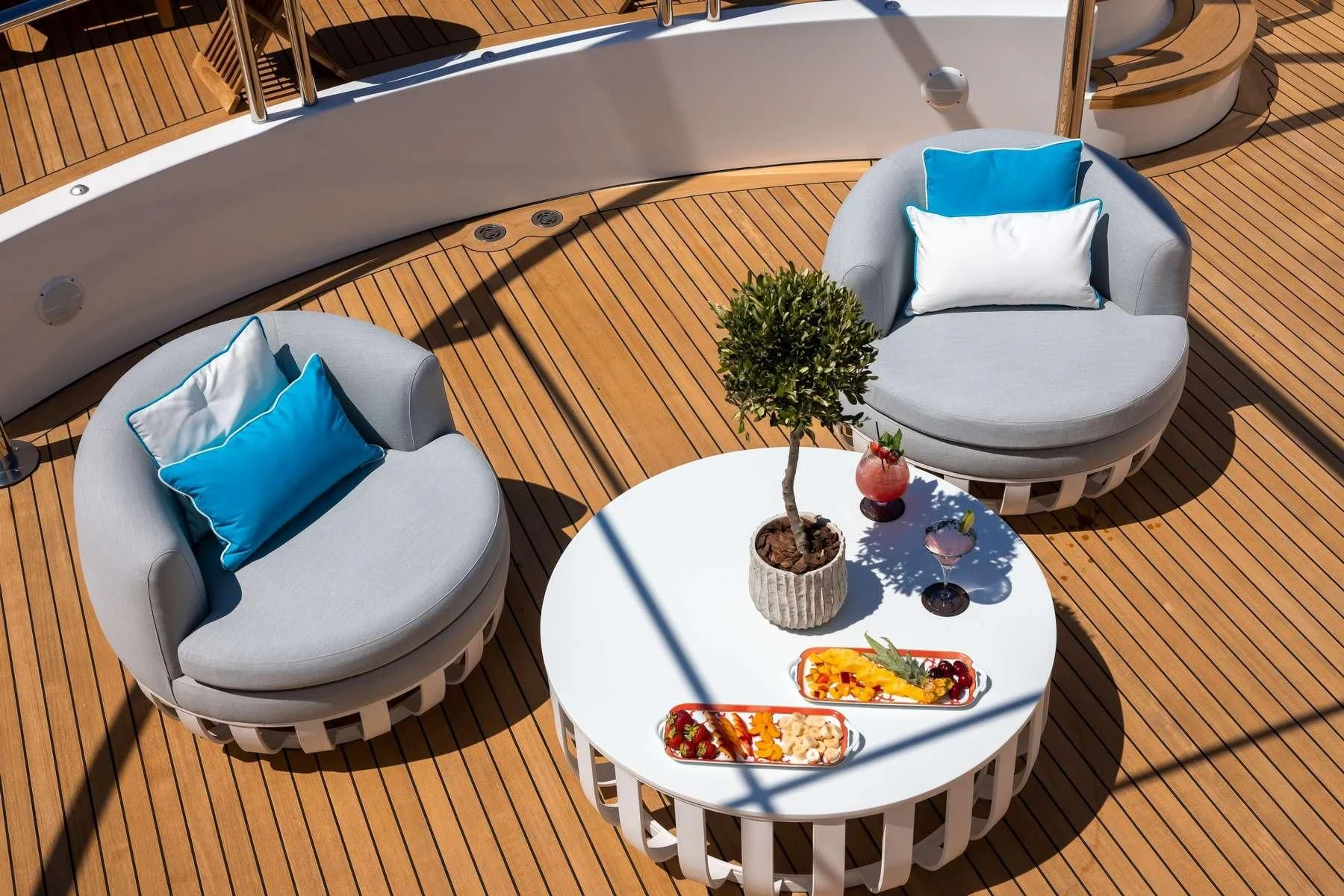 a table with food and a plate aboard DILARA Yacht for Sale