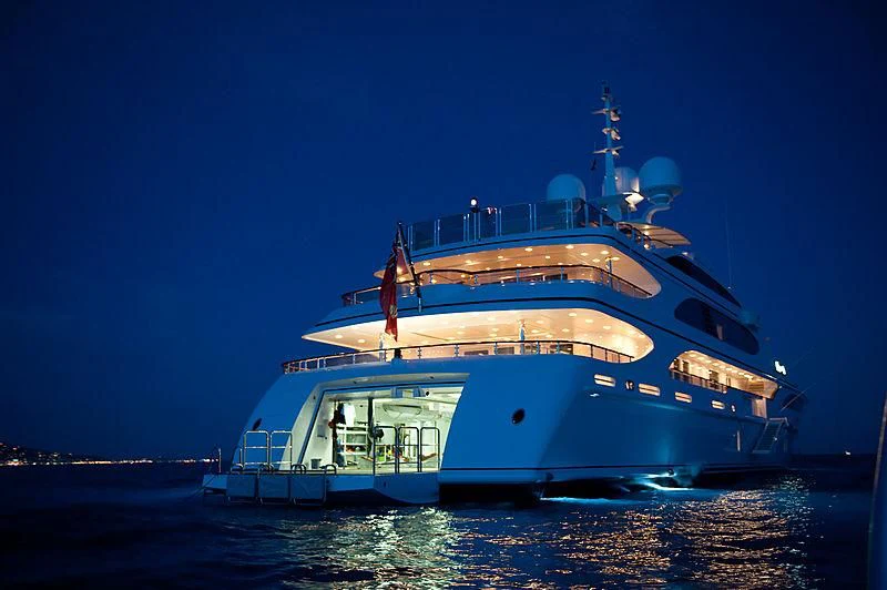 a large white boat in the water aboard DILARA Yacht for Sale