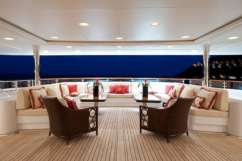 a room with couches and chairs aboard DILARA Yacht for Sale