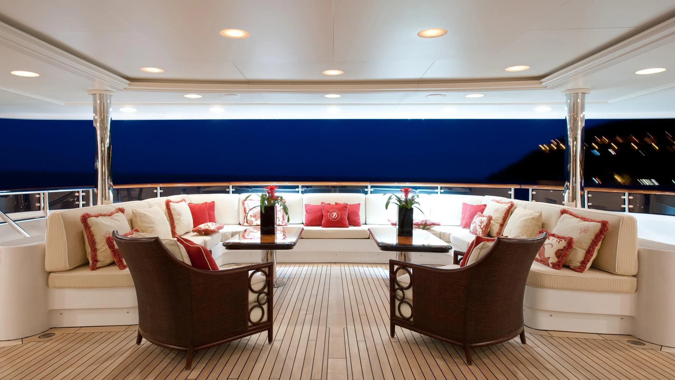 a living room with couches and chairs aboard DILARA Yacht for Sale