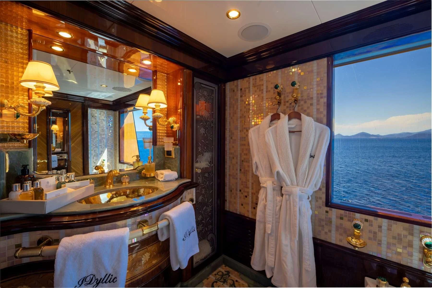 a fancy bathroom with a large window aboard DILARA Yacht for Sale