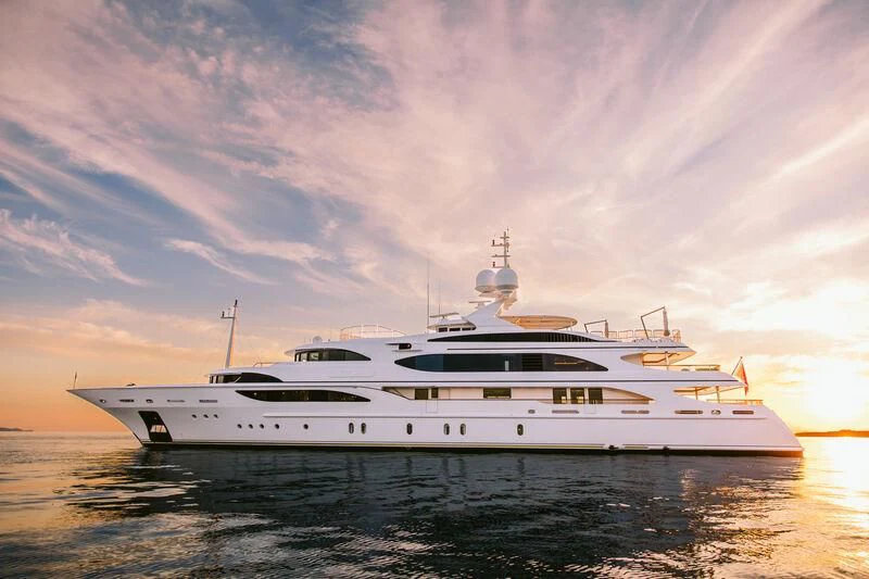 a white yacht in the water aboard DILARA Yacht for Sale