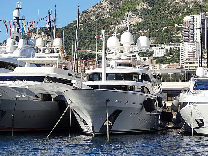 several boats are parked in the water aboard DILARA Yacht for Sale