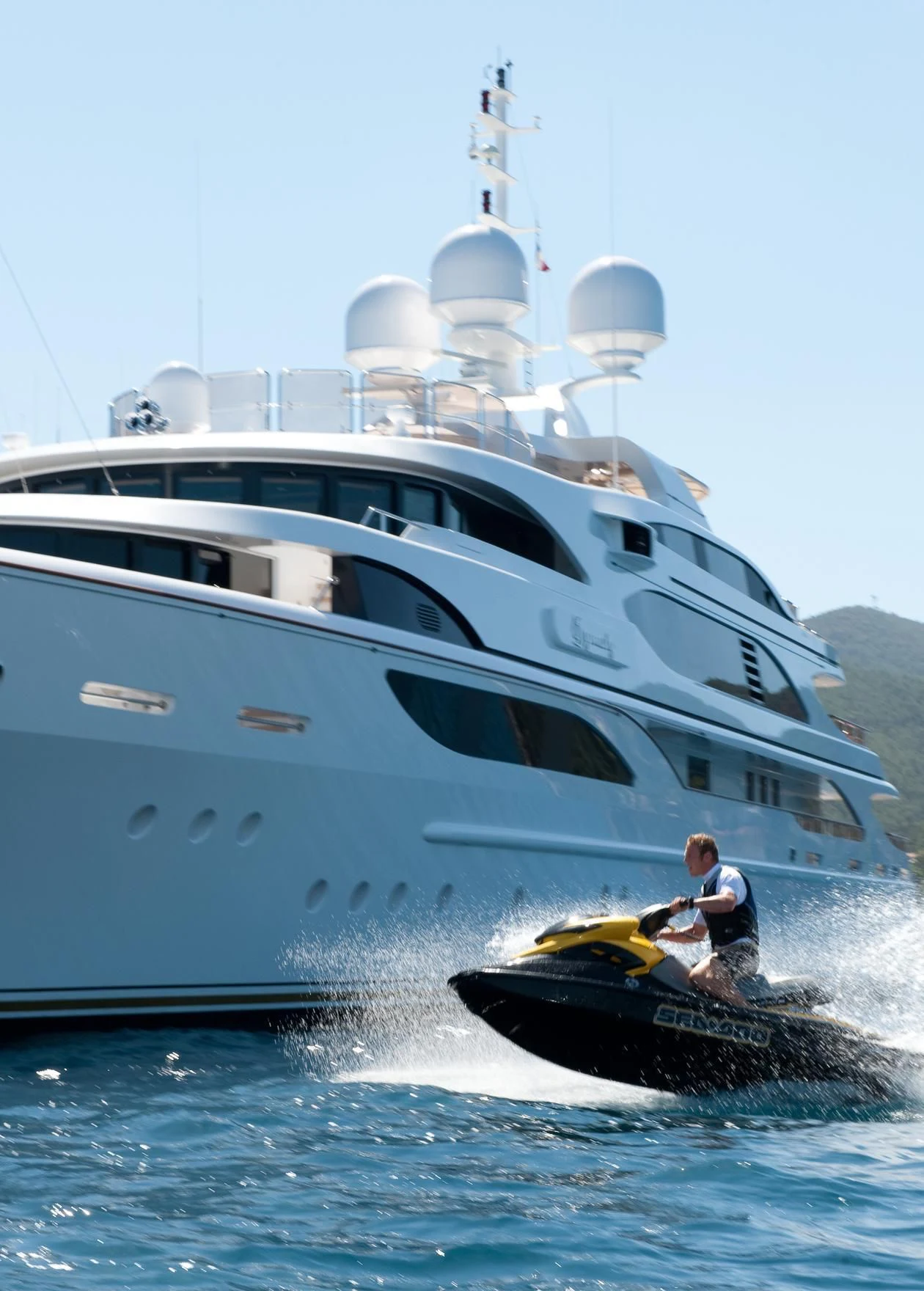 a person and a boy on a boat in the water aboard DILARA Yacht for Sale