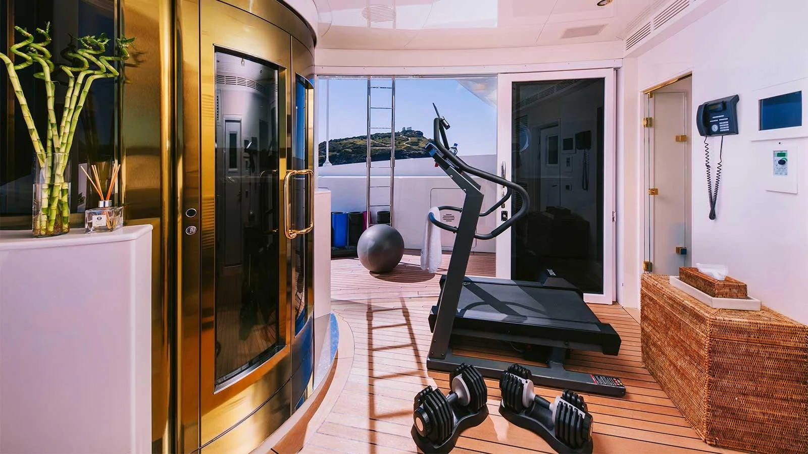 a gym with exercise equipment aboard DILARA Yacht for Sale