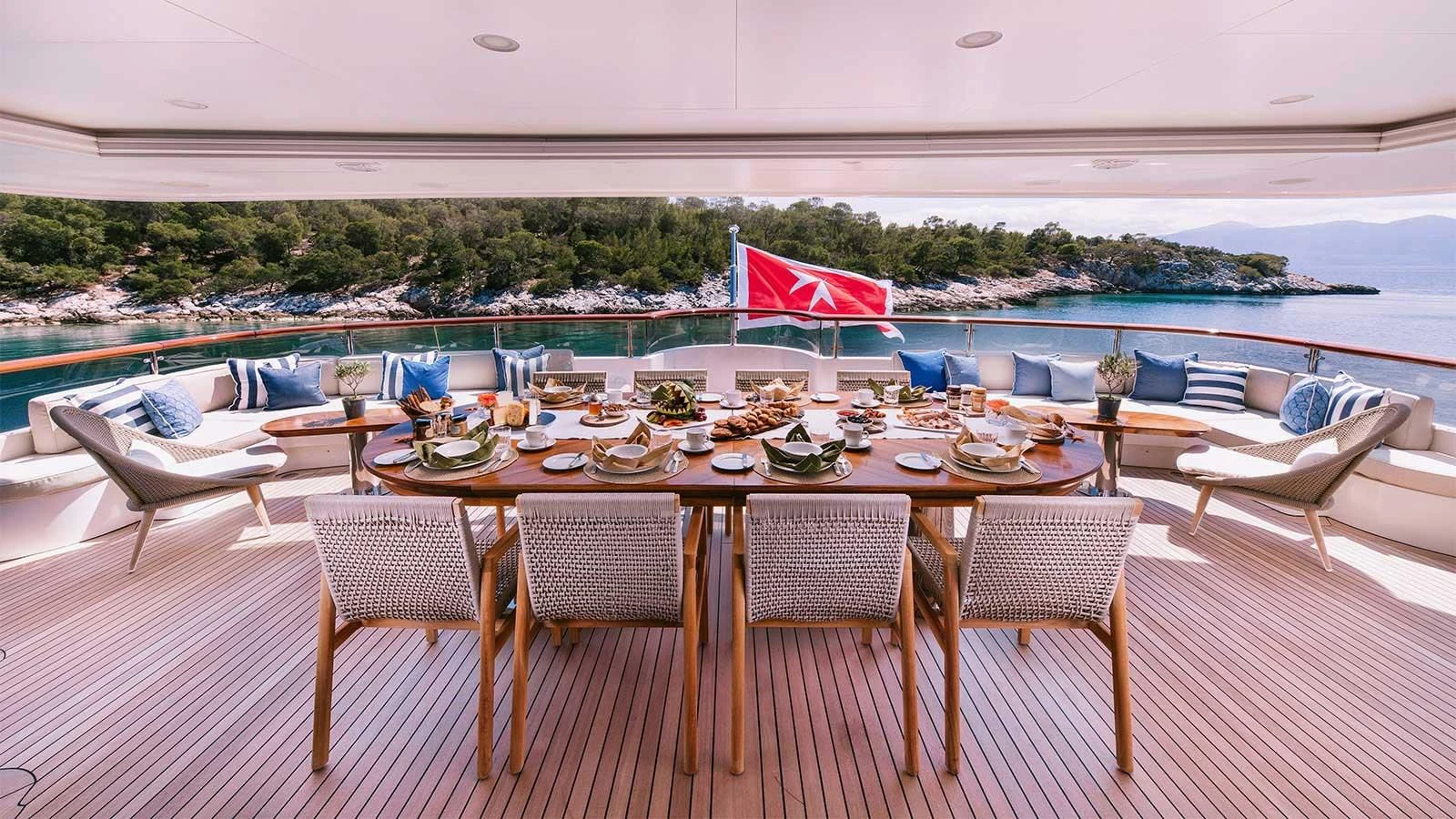 a table set for a meal aboard DILARA Yacht for Sale