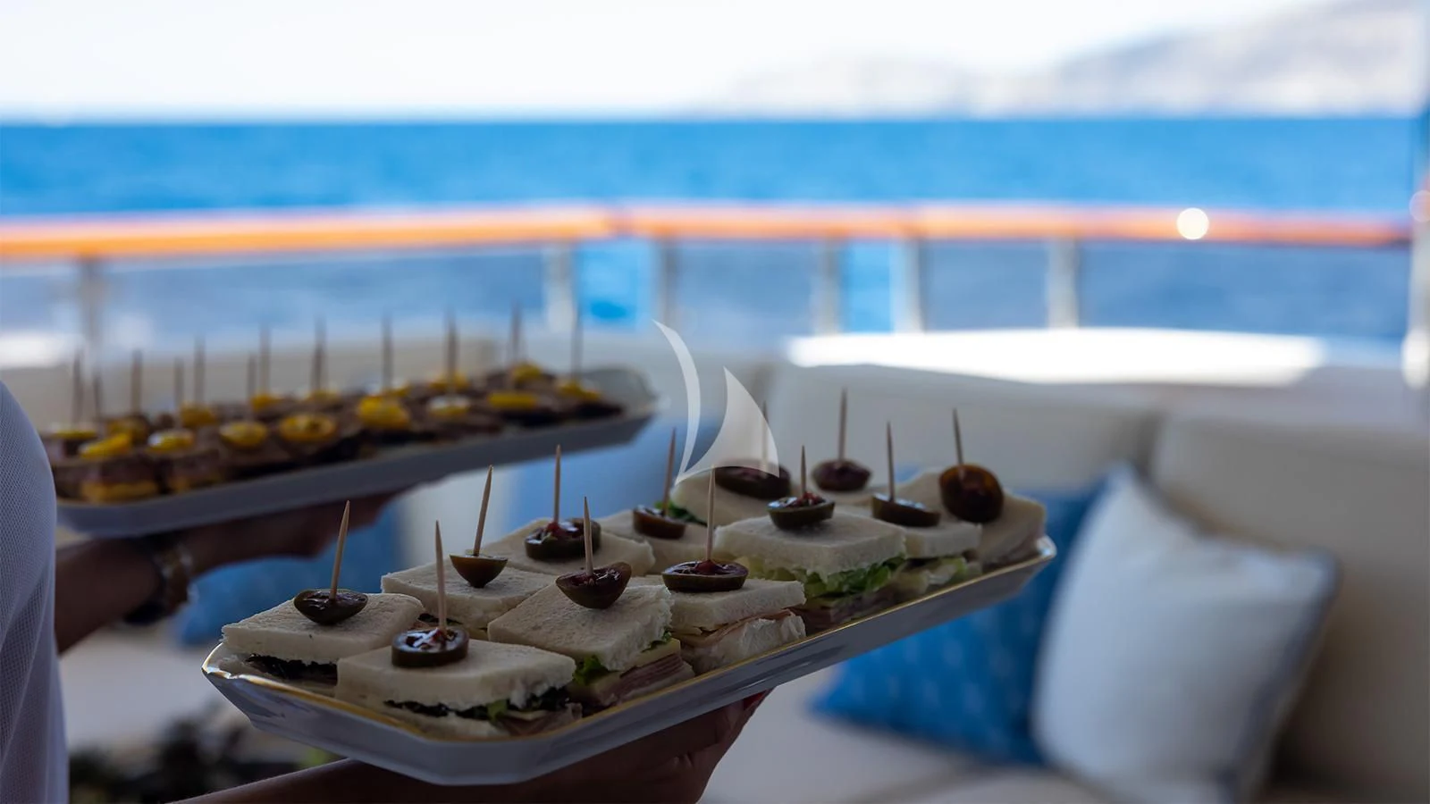 a table with desserts on it aboard DILARA Yacht for Sale