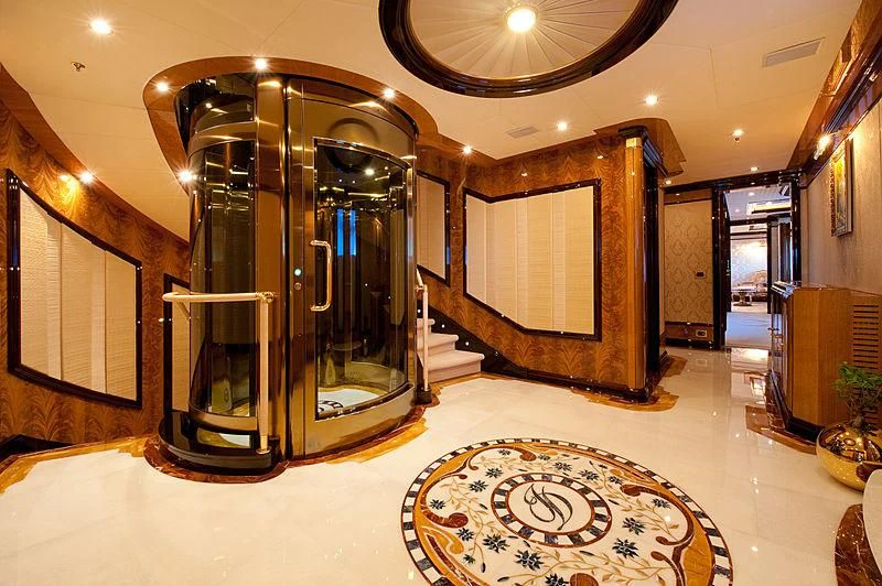 a large room with a large mirror aboard DILARA Yacht for Sale