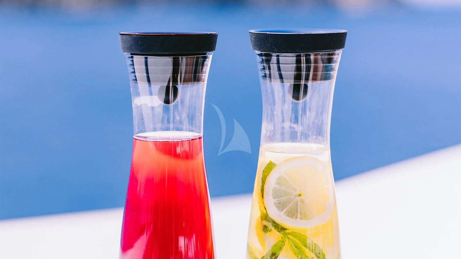 a couple of glasses with liquid in them aboard DILARA Yacht for Sale