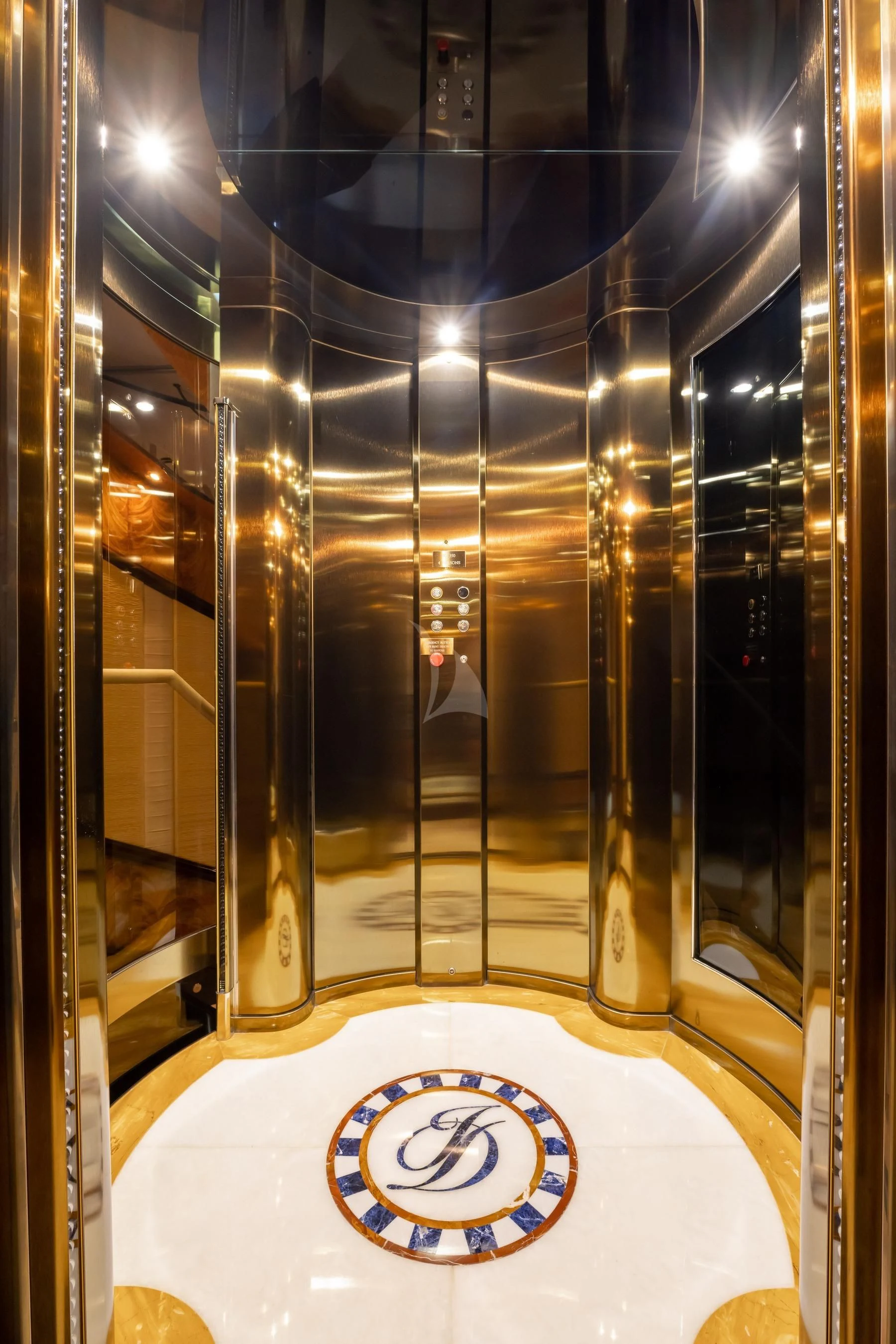 a large gold and blue clock aboard DILARA Yacht for Sale