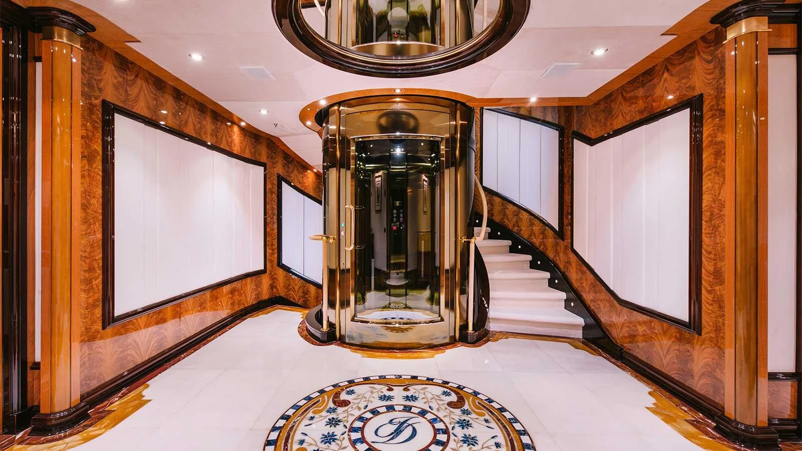 a room with a large mirror aboard DILARA Yacht for Sale