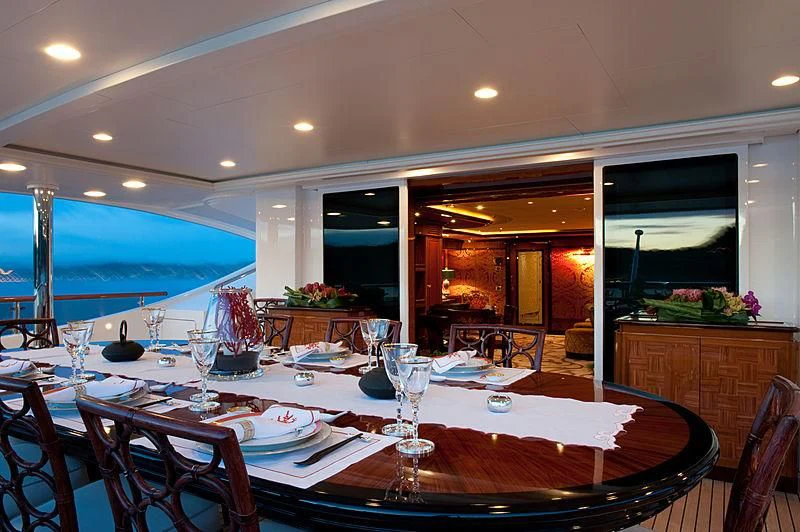 a table set for a dinner aboard DILARA Yacht for Sale