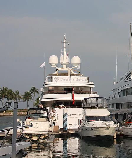 a group of boats are parked in a harbor aboard DILARA Yacht for Sale