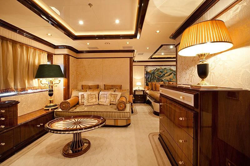 a living room with a large mirror aboard DILARA Yacht for Sale