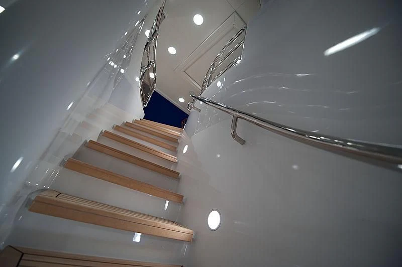 a set of wooden stairs aboard DILARA Yacht for Sale