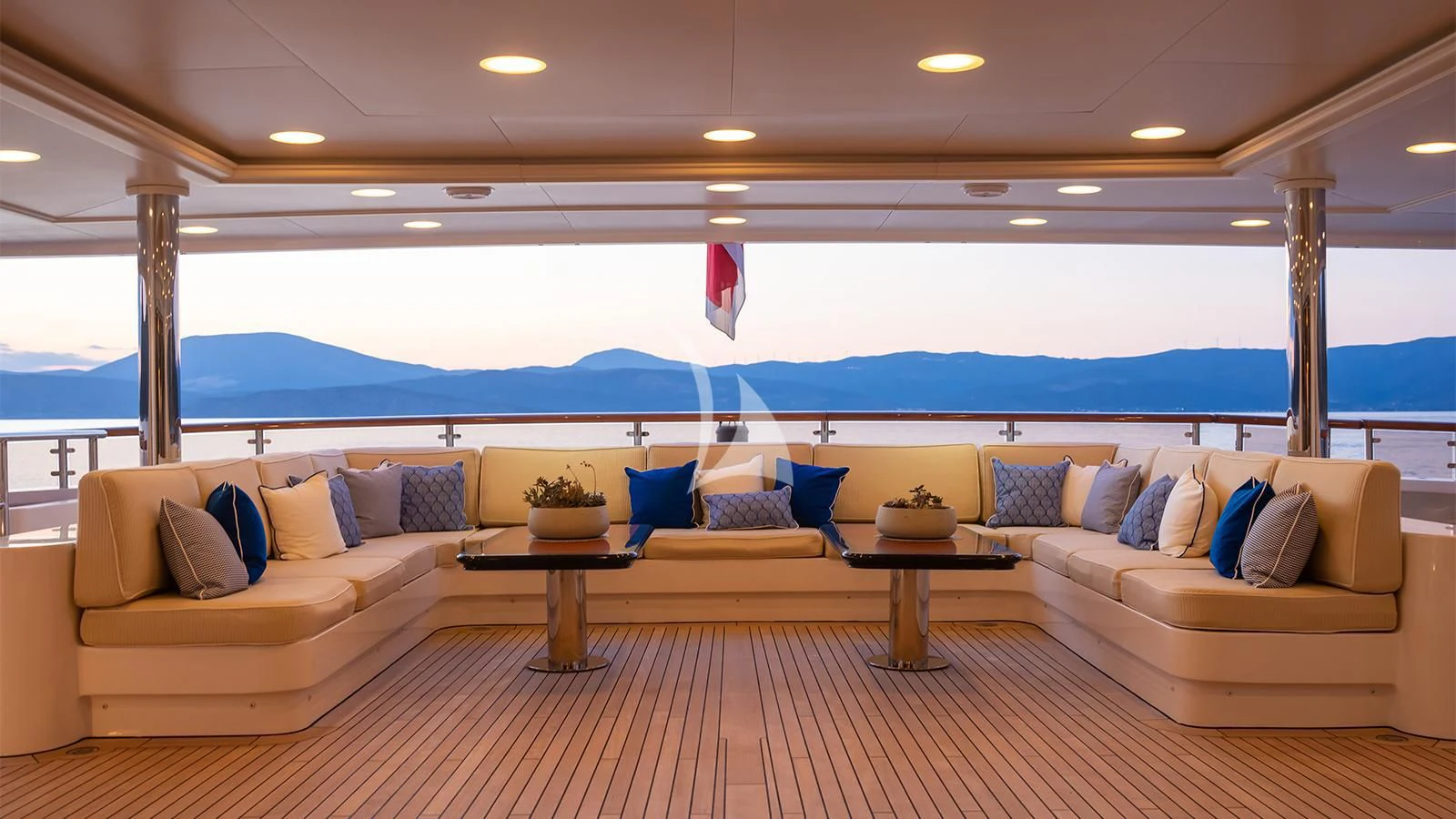 a living room with a large patio aboard DILARA Yacht for Sale