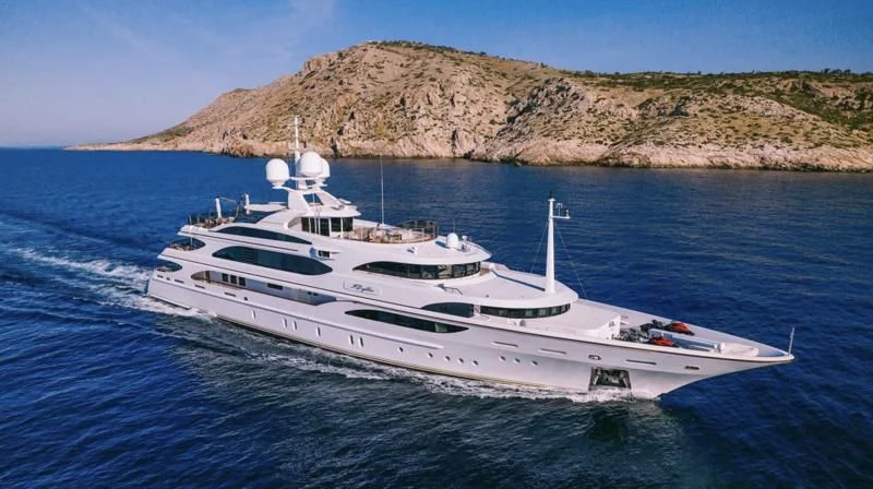 a white yacht on the water aboard DILARA Yacht for Sale