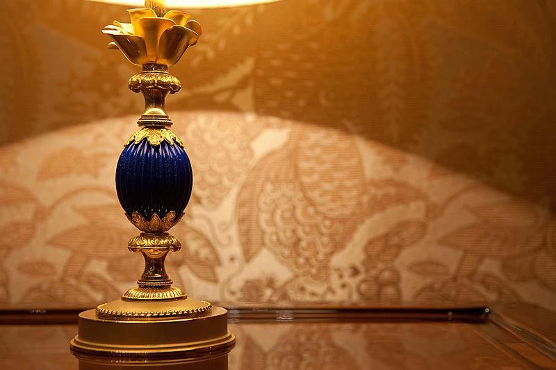 a gold trophy on a table aboard DILARA Yacht for Sale
