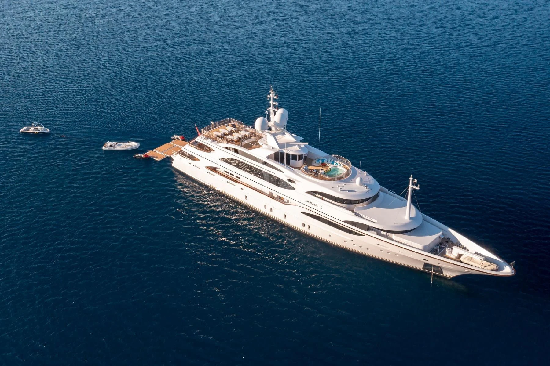 a white boat in the water aboard DILARA Yacht for Sale