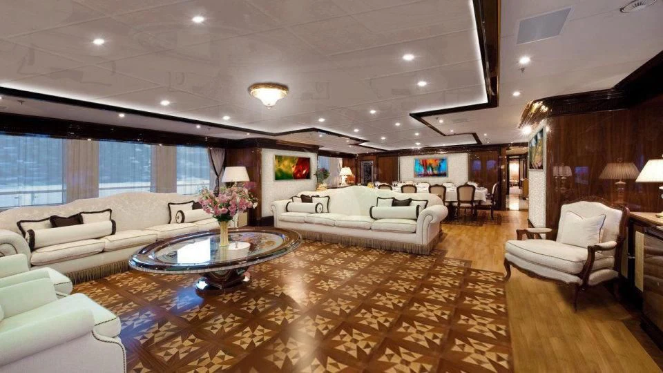 a living room with a large window aboard DILARA Yacht for Sale