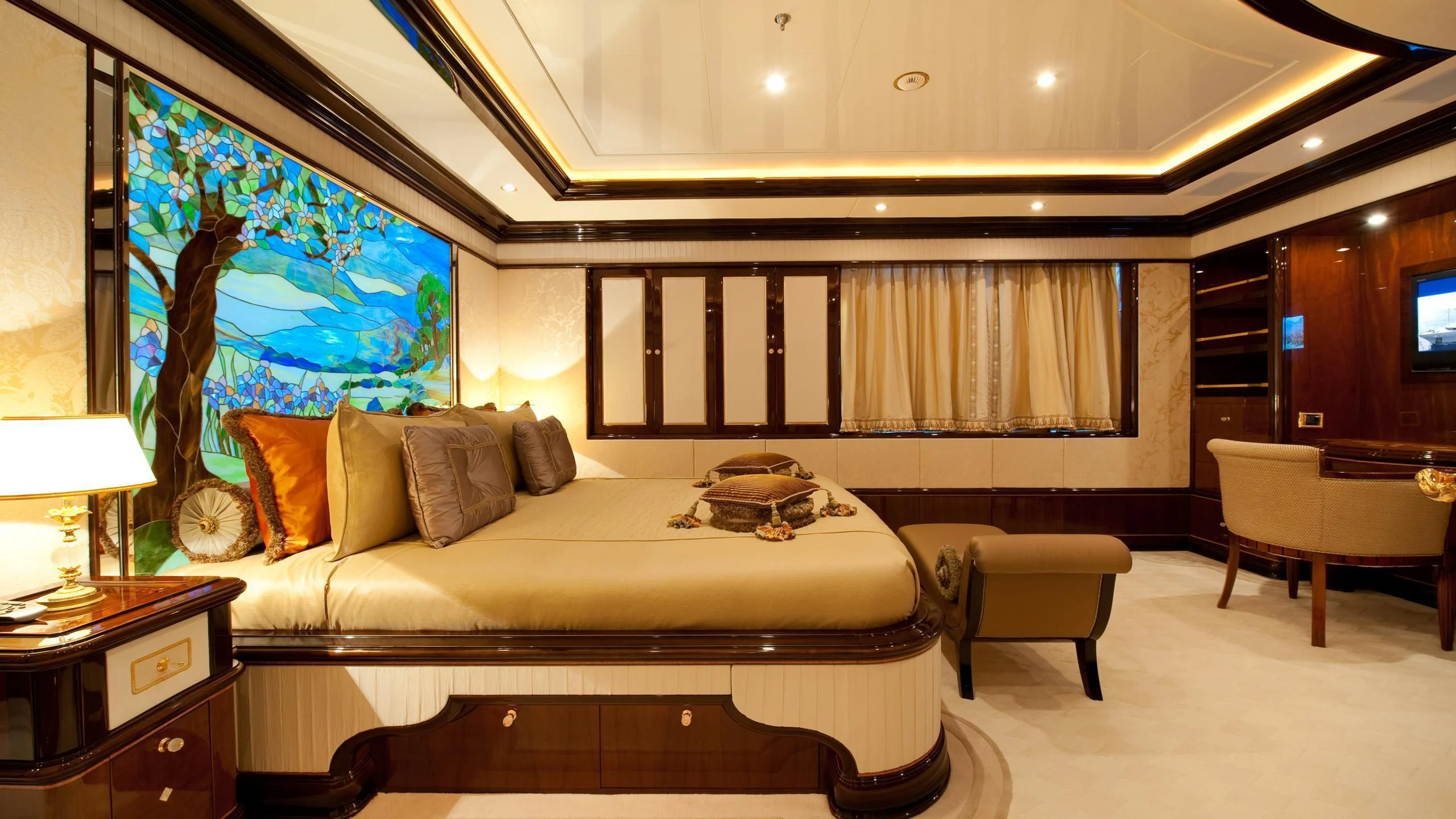 a bed in a room aboard DILARA Yacht for Sale