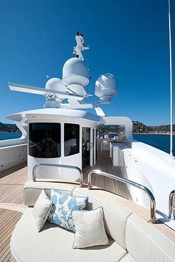 a boat with a statue on it aboard DILARA Yacht for Sale