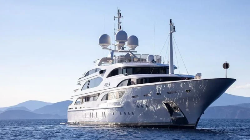 a large white boat in the water aboard DILARA Yacht for Sale