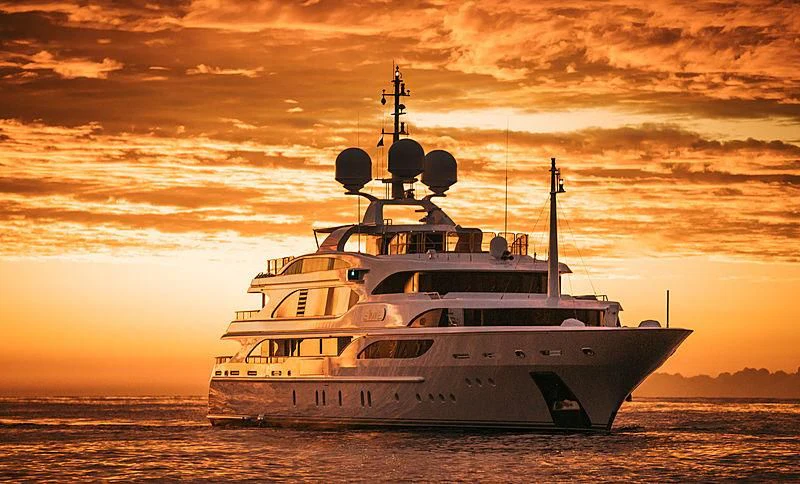 a large white ship in the water aboard DILARA Yacht for Sale