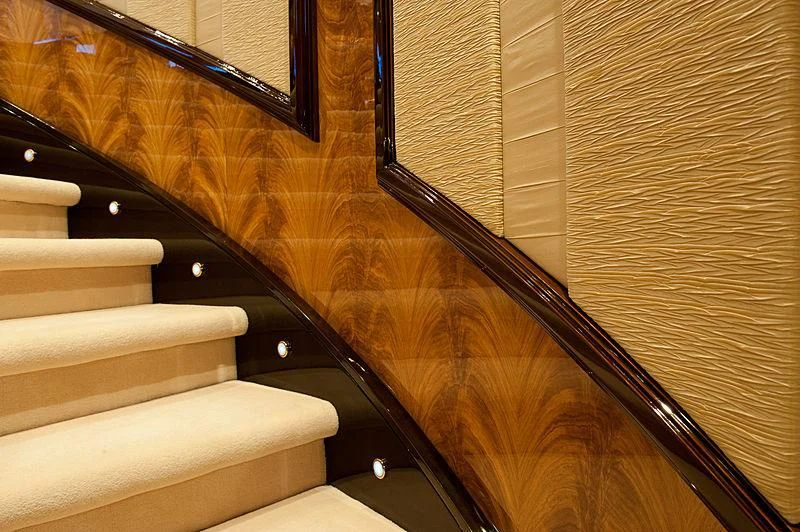 a staircase with a glass window aboard DILARA Yacht for Sale