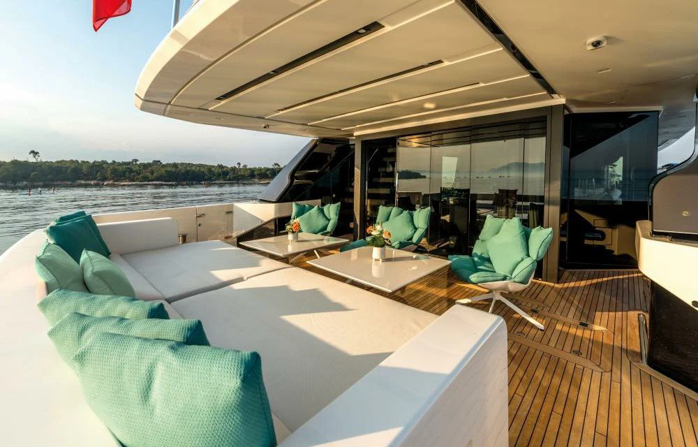 a room with a view of the ocean and the deck aboard DILARA Yacht for Sale