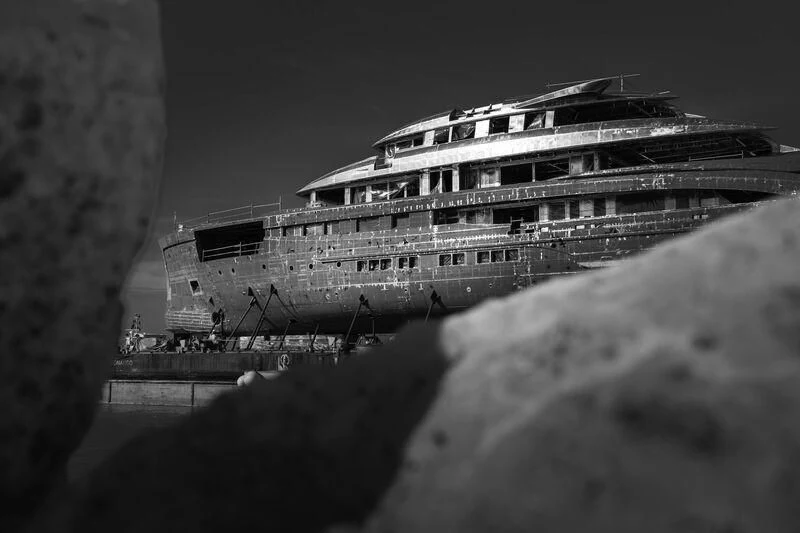 a large building with a bridge aboard AMOR À VIDA Yacht for Sale