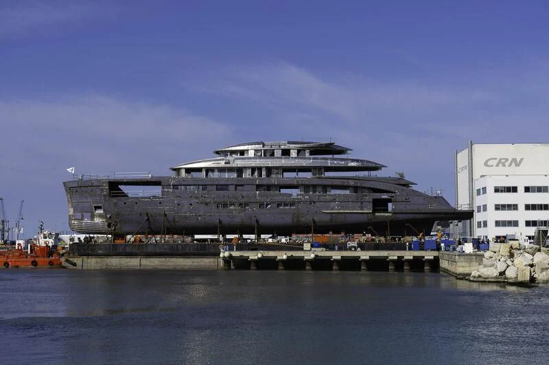 a large cruise ship docked aboard AMOR À VIDA Yacht for Sale
