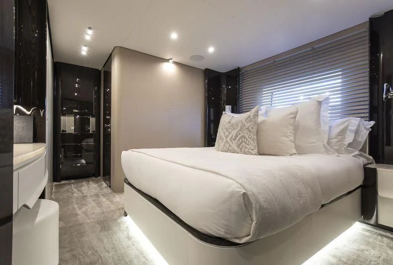 a bed in a hotel room aboard NEMESIS Yacht for Sale