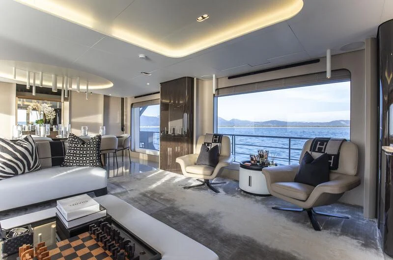 a living room with a large window aboard NEMESIS Yacht for Sale