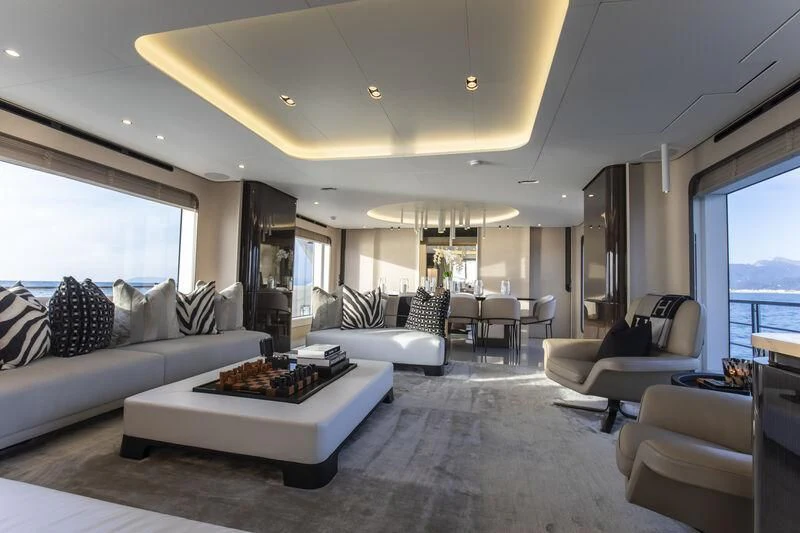 a living room with a large window aboard NEMESIS Yacht for Sale