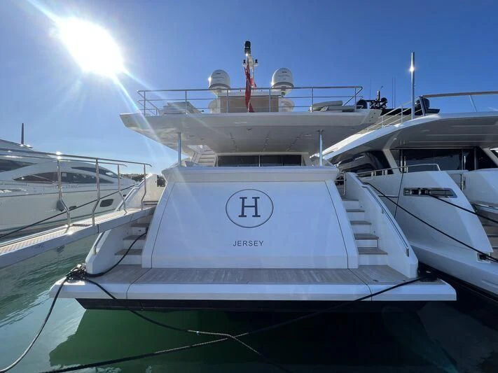 a large white yacht aboard NEMESIS Yacht for Sale