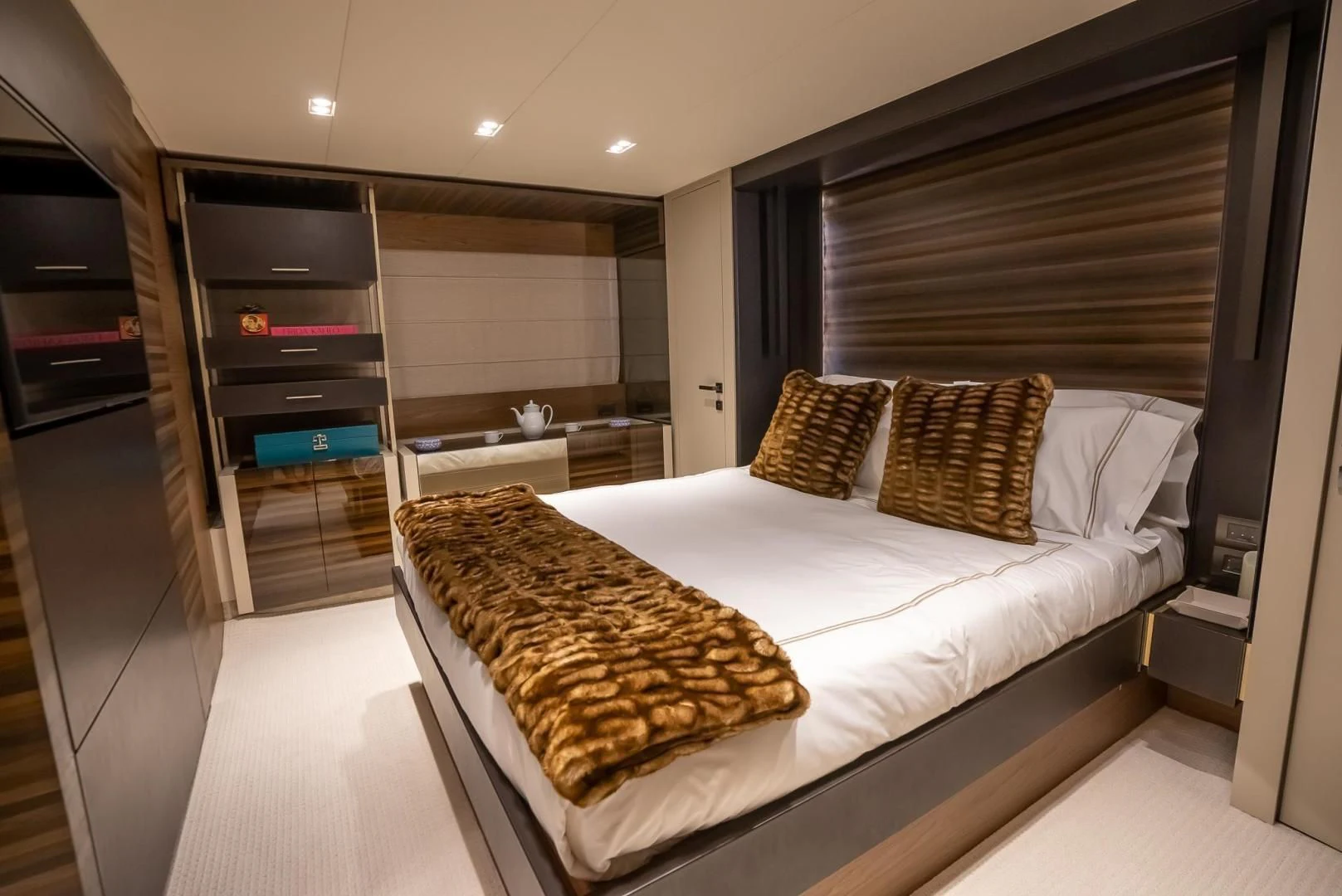 a large bedroom with a bed aboard LEGEND Yacht for Sale