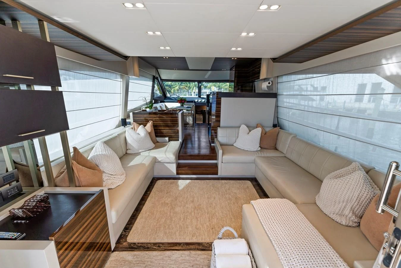 a living room with a large window aboard LEGEND Yacht for Sale