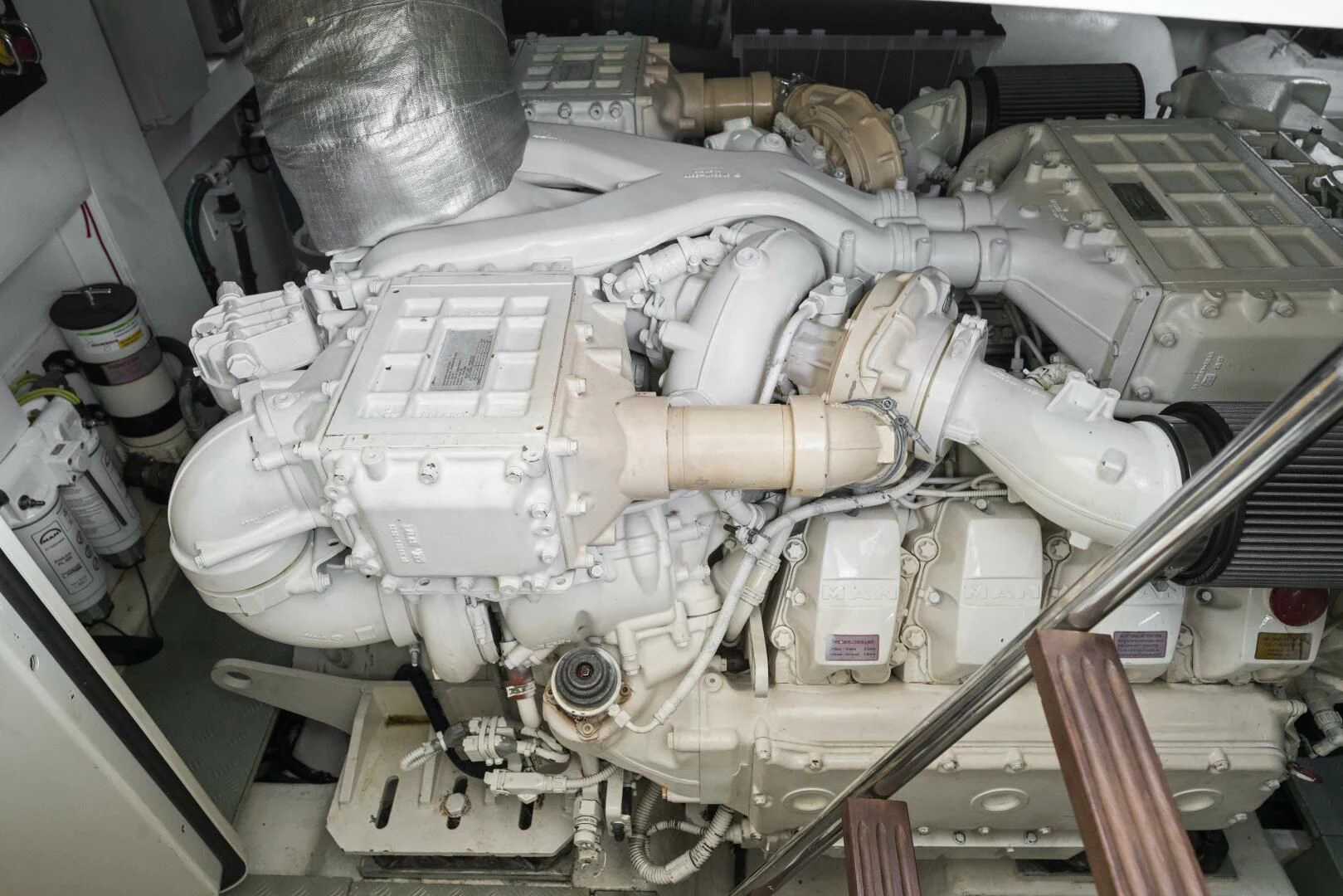 a machine with a large metal cylinder aboard LEGEND Yacht for Sale