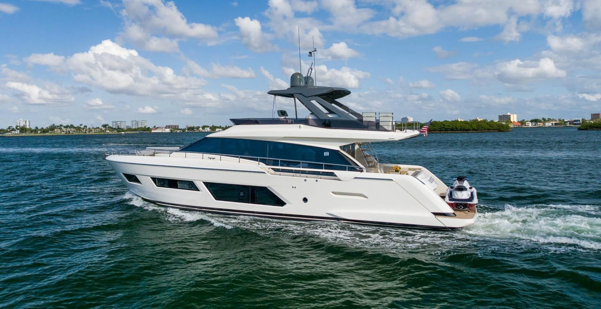 a white boat on the water aboard LEGEND Yacht for Sale