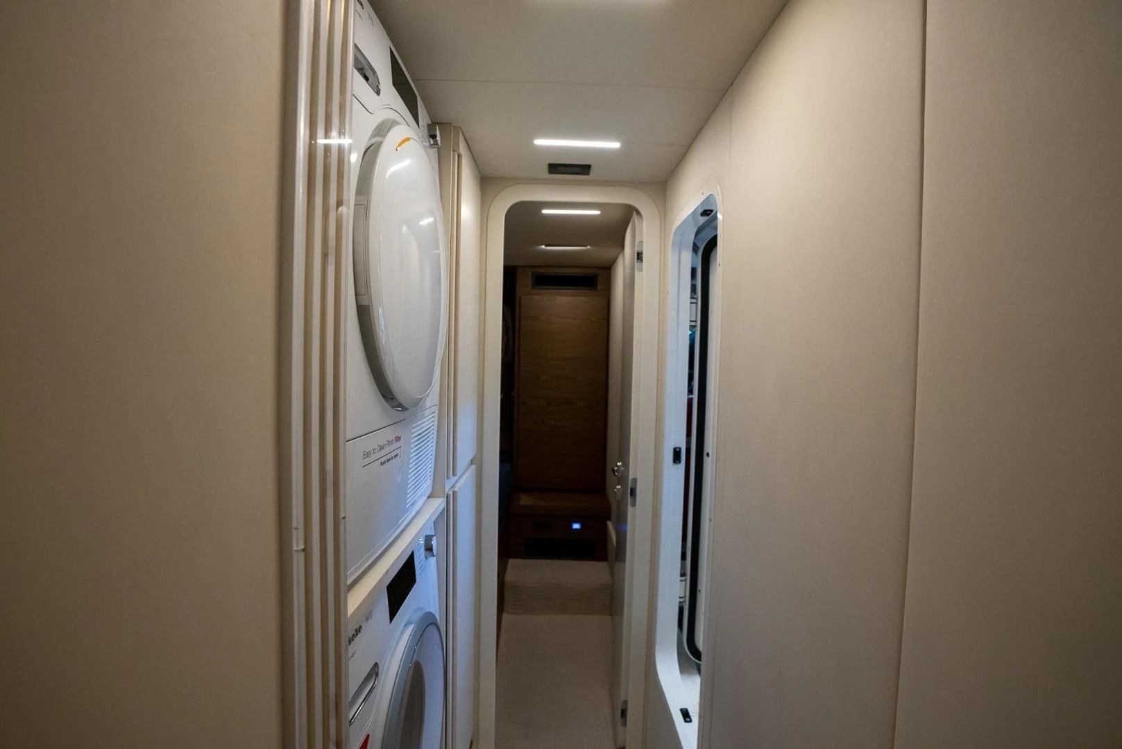 a hallway with doors aboard LEGEND Yacht for Sale