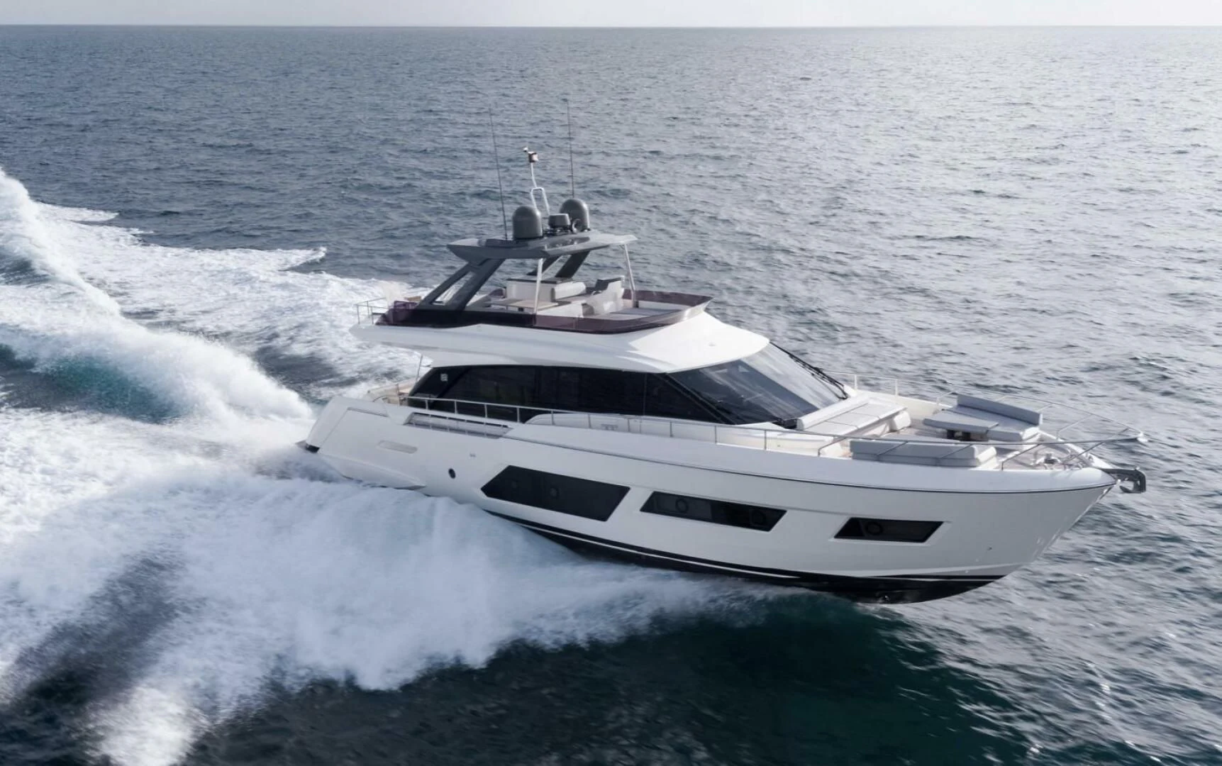 a white yacht on the water aboard LEGEND Yacht for Sale
