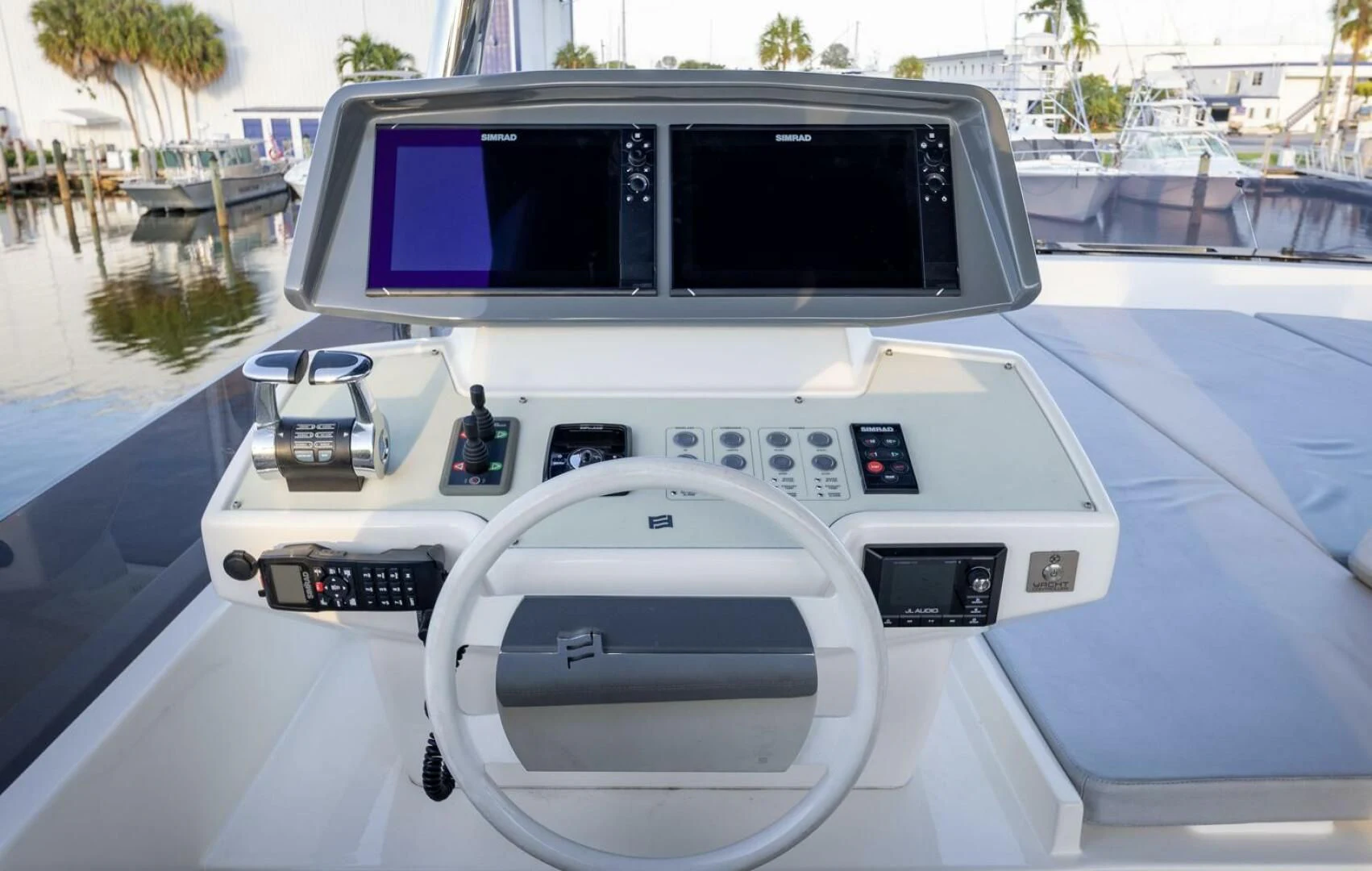 a white car with a screen aboard LEGEND Yacht for Sale