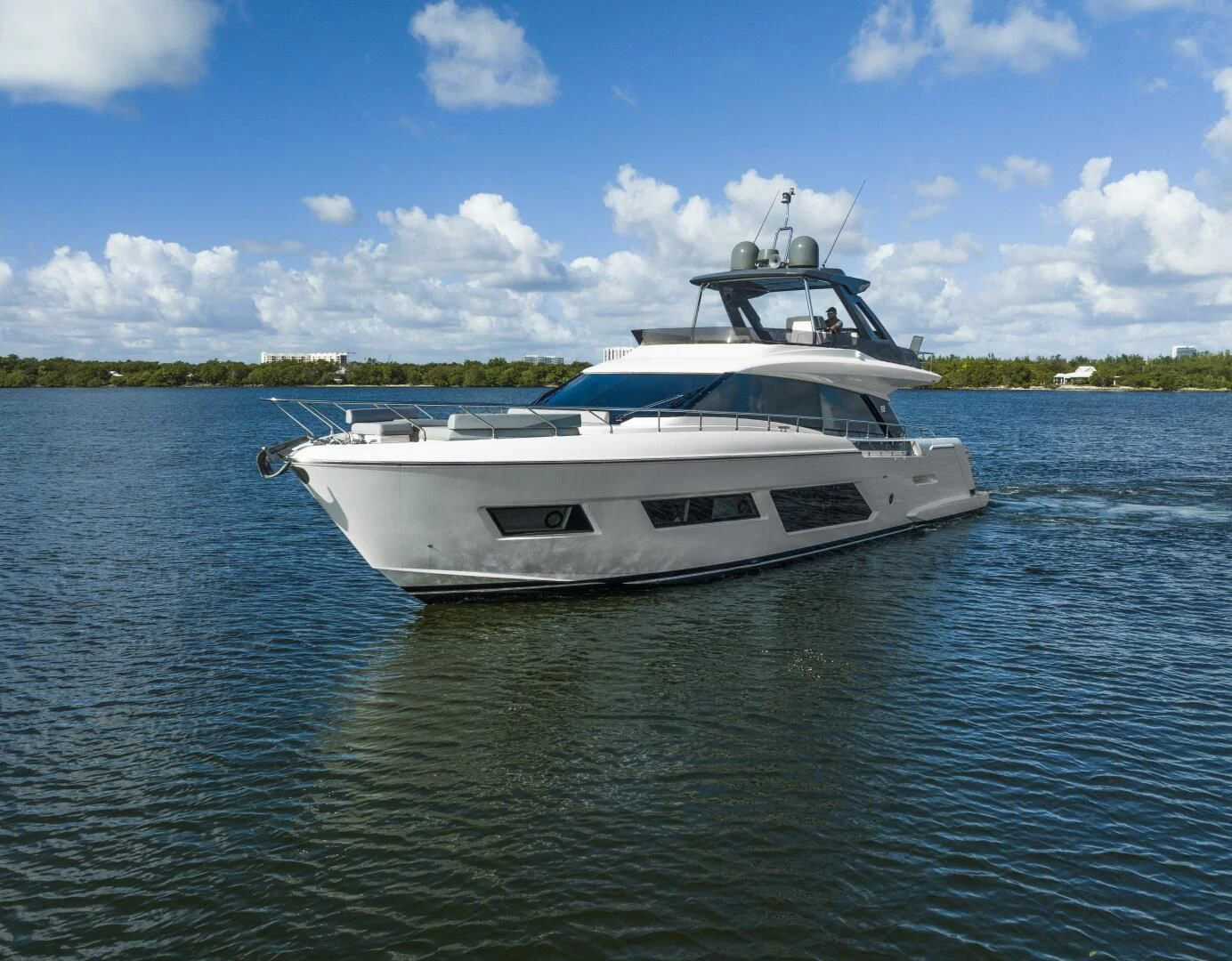 a white yacht on the water aboard LEGEND Yacht for Sale
