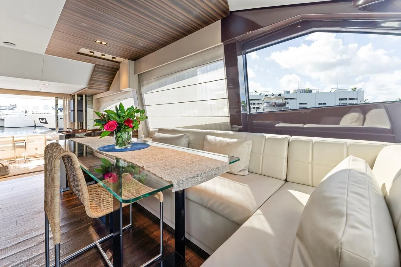 a car with a table and chairs aboard LEGEND Yacht for Sale