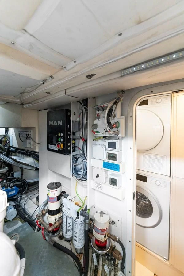 a room with machines and equipment aboard LEGEND Yacht for Sale