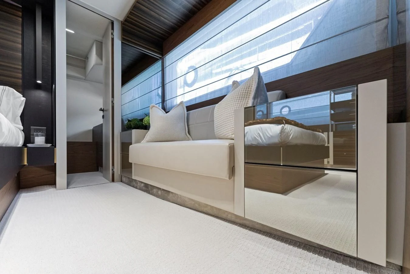 a bed in a room aboard LEGEND Yacht for Sale