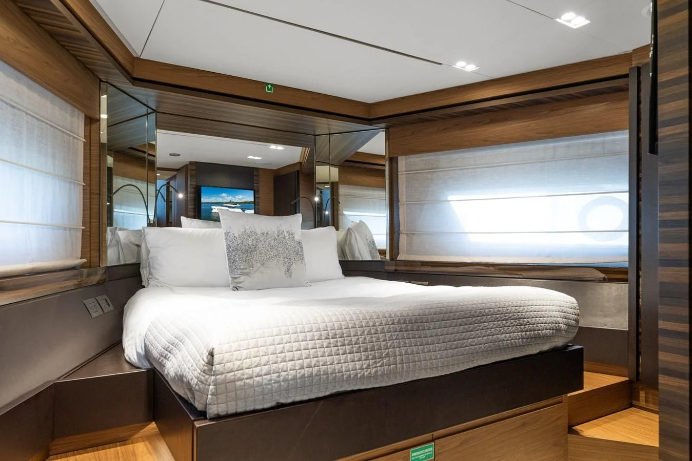a bed in a room aboard LEGEND Yacht for Sale