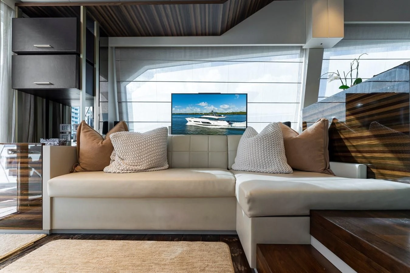 a couch in a room aboard LEGEND Yacht for Sale